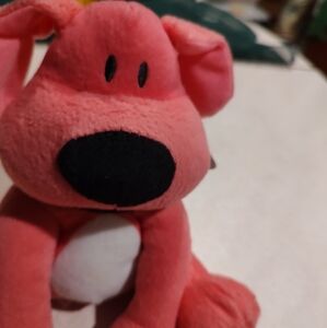 Adorable plush toy perfect for any dog lover. It features a cute and Cuddly pink